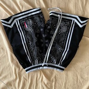 Collect and Select swingman shorts, black paisley